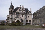 1492 W WISCONSIN AVE, a Romanesque Revival house, built in Milwaukee, Wisconsin in 1886.