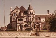 1492 W WISCONSIN AVE, a Romanesque Revival house, built in Milwaukee, Wisconsin in 1886.