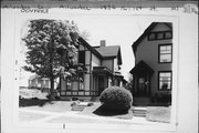 1830 N 1ST ST, a Queen Anne house, built in Milwaukee, Wisconsin in 1890.