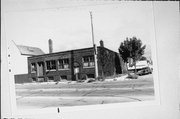 838 S 1ST ST, a Twentieth Century Commercial small office building, built in Milwaukee, Wisconsin in 1919.