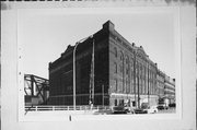 100 S 2ND ST, a Romanesque Revival warehouse, built in Milwaukee, Wisconsin in 1892.