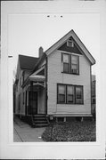 1409 S 3RD ST, a Queen Anne house, built in Milwaukee, Wisconsin in 1889.