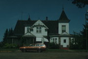 513 DALE ST, a Queen Anne house, built in Spooner, Wisconsin in 1904.