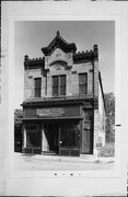 830-832 S 5TH ST, a Italianate retail building, built in Milwaukee, Wisconsin in 1883.