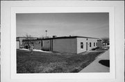 438 E. Goldleaf Ave, a Astylistic Utilitarian Building fire house, built in Milwaukee, Wisconsin in 1962.