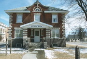 221 S STE. MARIE ST, a Colonial Revival/Georgian Revival jail/correctional facility, built in Wautoma, Wisconsin in 1908.