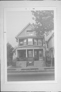 1661 - 1659 S 6TH ST, a Queen Anne duplex/two-flat, built in Milwaukee, Wisconsin in 1907.