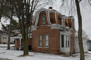 229 N MONROE ST, a Second Empire house, built in Lancaster, Wisconsin in 1874.