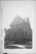 1113 N 21ST ST, a Queen Anne house, built in Milwaukee, Wisconsin in 1899.