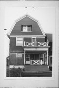 1331-1333 N 23RD ST, a Dutch Colonial Revival duplex/two-flat, built in Milwaukee, Wisconsin in 1899.