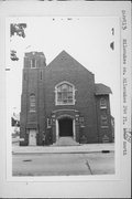 1874 N 24TH PLACE, a Late Gothic Revival church, built in Milwaukee, Wisconsin in 1921.