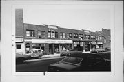 817-831 N 27TH ST, a Spanish/Mediterranean Styles retail building, built in Milwaukee, Wisconsin in 1926.