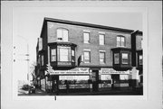 962-966 N 27TH ST, a Queen Anne retail building, built in Milwaukee, Wisconsin in 1902.