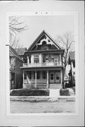 931-933 N 33RD ST, a Colonial Revival/Georgian Revival duplex, built in Milwaukee, Wisconsin in 1897.