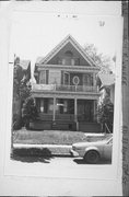 931-933 N 33RD ST, a Colonial Revival/Georgian Revival duplex, built in Milwaukee, Wisconsin in 1897.