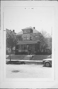 1913-1915 N 33RD ST, a American Foursquare house, built in Milwaukee, Wisconsin in 1912.
