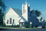 301 PINE ST, a Queen Anne house of worship, built in Grantsburg, Wisconsin in 1898.