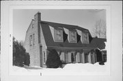 3715 N 56TH ST, a Dutch Colonial Revival house, built in Milwaukee, Wisconsin in 1937.