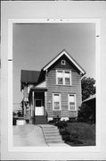 1689-1689A N ASTOR, a Gabled Ell house, built in Milwaukee, Wisconsin in 1953.