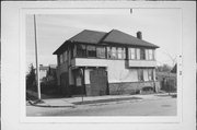 2433-2435 W AUER AVE, a Arts and Crafts house, built in Milwaukee, Wisconsin in 1913.