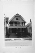 2410-2412 N BOOTH, a Arts and Crafts duplex/two-flat, built in Milwaukee, Wisconsin in 1914.