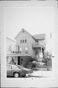 1021-1023 E BRADY ST, a Queen Anne house, built in Milwaukee, Wisconsin in 1890.