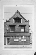 1024 E BRADY ST, a German Renaissance Revival small retail building, built in Milwaukee, Wisconsin in 1910.