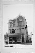 1115-1117 E BRADY ST, a Queen Anne small retail building, built in Milwaukee, Wisconsin in 1888.