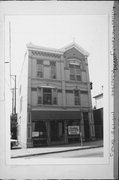 1115-1117 E BRADY ST, a Queen Anne small retail building, built in Milwaukee, Wisconsin in 1888.