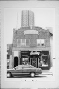 1229-1231 E BRADY ST, a Spanish/Mediterranean Styles retail building, built in Milwaukee, Wisconsin in 1929.