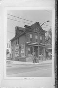1316 E BRADY ST, a Italianate small retail building, built in Milwaukee, Wisconsin in 1886.