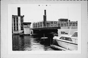 Over the Milwaukee River between N. Young Street and E. Pittsburgh Avenue, a NA (unknown or not a building) bridge, built in Milwaukee, Wisconsin in 1982.