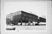 301-315 N BROADWAY ST, a Commercial Vernacular retail building, built in Milwaukee, Wisconsin in 1894.