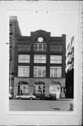 221 E BUFFALO AVE, a Romanesque Revival small office building, built in Milwaukee, Wisconsin in 1893.