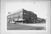 2551-2565 N DOWNER AVE, a Twentieth Century Commercial automobile showroom, built in Milwaukee, Wisconsin in 1916.