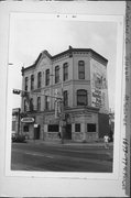 1673-1677 N FARWELL AVE, a Italianate retail building, built in Milwaukee, Wisconsin in 1880.