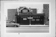 1724 N FARWELL, a Commercial Vernacular small retail building, built in Milwaukee, Wisconsin in 1932.