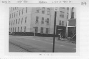 C. 122 W MAIN ST, a International Style large office building, built in Madison, Wisconsin in 1950.
