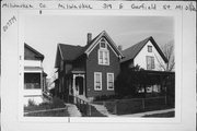318 E GARFIELD AVE, a Gabled Ell house, built in Milwaukee, Wisconsin in 1900.