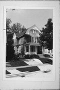 2753 N HACKETT AVE, a Dutch Colonial Revival house, built in Milwaukee, Wisconsin in 1895.