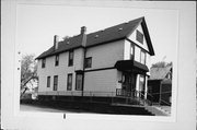 2342-42A S HOWELL AVE, a Queen Anne duplex, built in Milwaukee, Wisconsin in 1937.