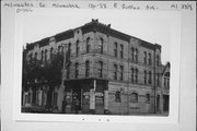150-158 E JUNEAU AVE, a Commercial Vernacular large retail building, built in Milwaukee, Wisconsin in 1874.
