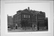 KILBOURN AVE AND MILWAUKEE ST, SW CORNER, a Romanesque Revival university or college building, built in Milwaukee, Wisconsin in 1894.
