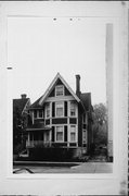 1115 E KNAPP ST, a Queen Anne house, built in Milwaukee, Wisconsin in 1885.