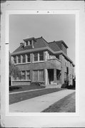 2440-2442 N LAKE DR, a Arts and Crafts duplex, built in Milwaukee, Wisconsin in 1925.
