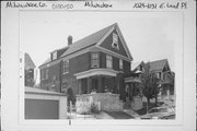 1029-1031 E LAND PL., a Queen Anne duplex/two-flat, built in Milwaukee, Wisconsin in 1905.