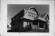 2718-20 S LENOX ST, a Dutch Colonial Revival duplex/two-flat, built in Milwaukee, Wisconsin in 1927.