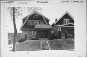 2718-20 S LENOX ST, a Dutch Colonial Revival duplex/two-flat, built in Milwaukee, Wisconsin in 1927.