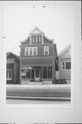 515 W HISTORIC MITCHELL ST, a Queen Anne small retail building, built in Milwaukee, Wisconsin in 1884.