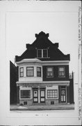 2029-2031 W MITCHELL ST, a German Renaissance Revival grocery, built in Milwaukee, Wisconsin in 1915.